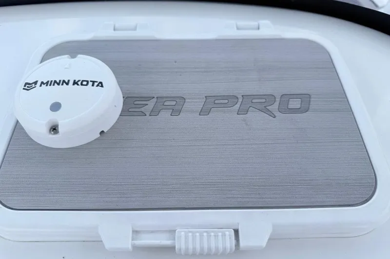 Slide: The Image of 2024 Sea Pro 222 Center Console with Minn Kota accessory on deck. - 6