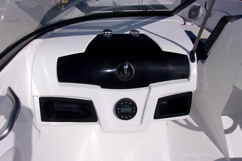 Slide: The Image of Dashboard of a 2021 Tahoe 550 TF boat, featuring sleek controls and modern design. - 6