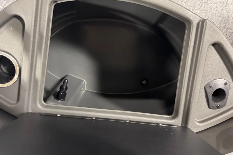 Slide: The Image of 2026 Sun Tracker SportFish 22 XP3 boat compartment with sleek design and functional features. - 10