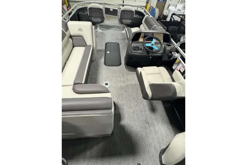 Slide: The Image of 2026 Sun Tracker SportFish 22 XP3 interior with plush seating and modern helm. - 20