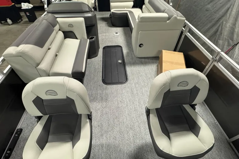 Slide: The Image of 2026 Sun Tracker SportFish 22 XP3 interior with plush seating and modern design. - 27