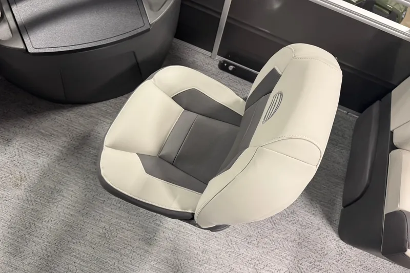 Slide: The Image of 2026 Sun Tracker SportFish 22 XP3 boat seat, featuring gray and beige upholstery. - 7