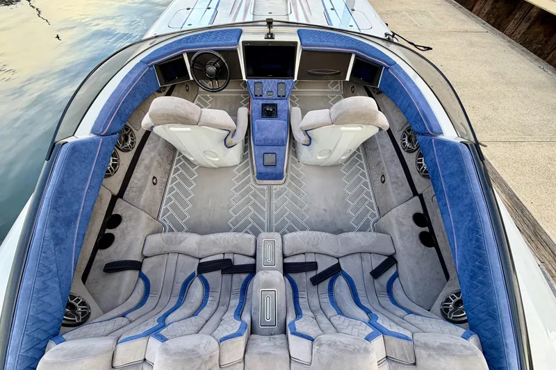 Slide: The Image of Luxurious interior of 2024 Dug Wright 32 boat with plush seating and modern design. - 15