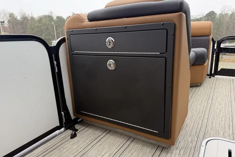 Slide: The Image of 2026 Premier 230 Sunsation RS CL boat interior with storage compartment and seating. - 15
