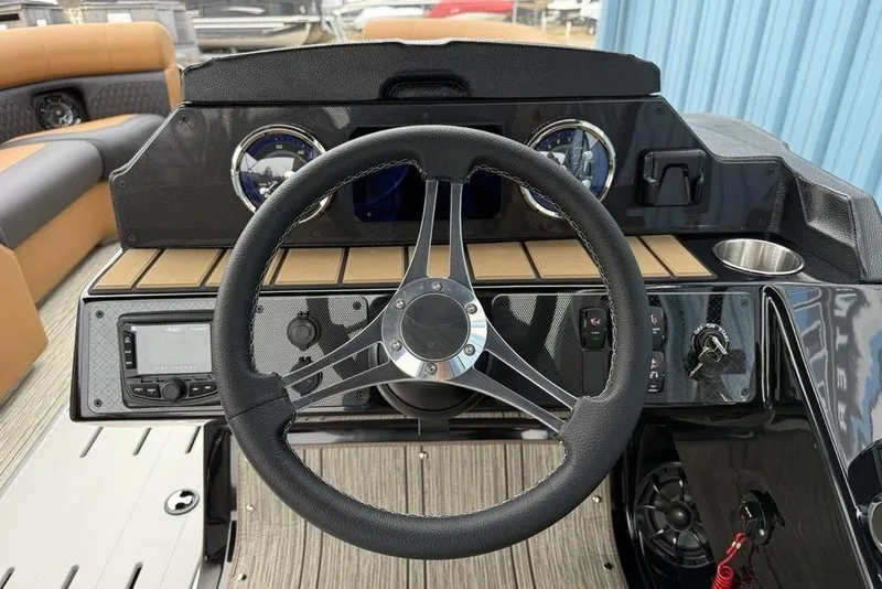 Slide: The Image of Steering console of 2026 Premier 230 Sunsation RS CL boat with modern controls. - 19