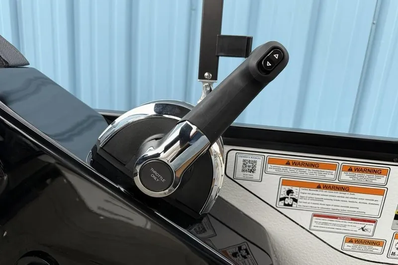 Slide: The Image of Throttle control lever on 2026 Premier 230 Sunsation RS CL boat dashboard. - 20