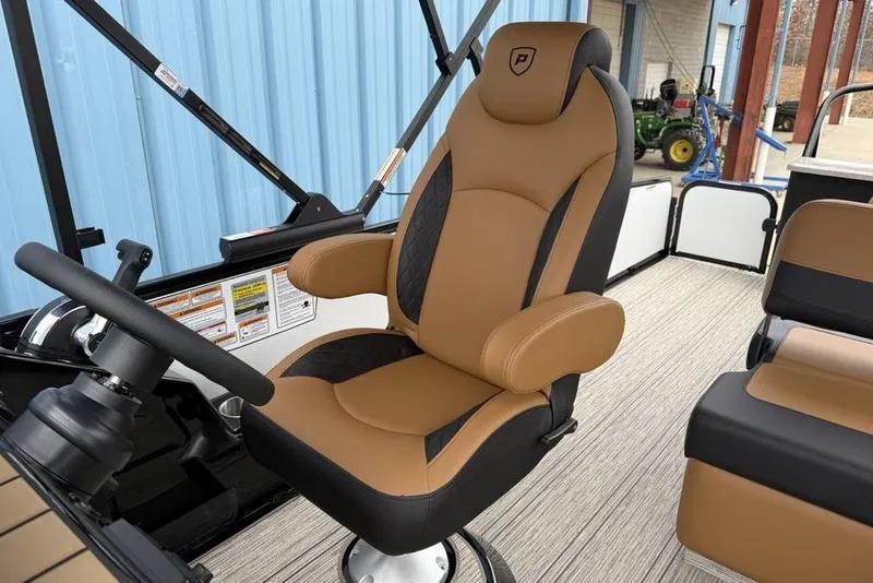 Slide: The Image of Luxurious captain's chair in 2026 Premier 230 Sunsation RS CL boat interior. - 21