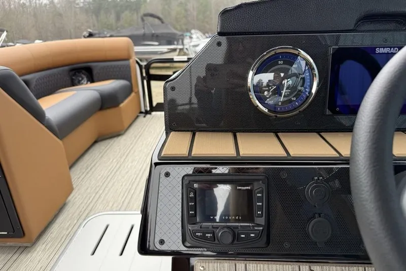Slide: The Image of Interior view of 2026 Premier 230 Sunsation RS CL boat dashboard with modern controls. - 24