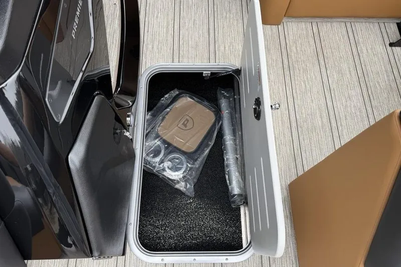 Slide: The Image of Open storage compartment in 2026 Premier 230 Sunsation RS CL boat. - 9