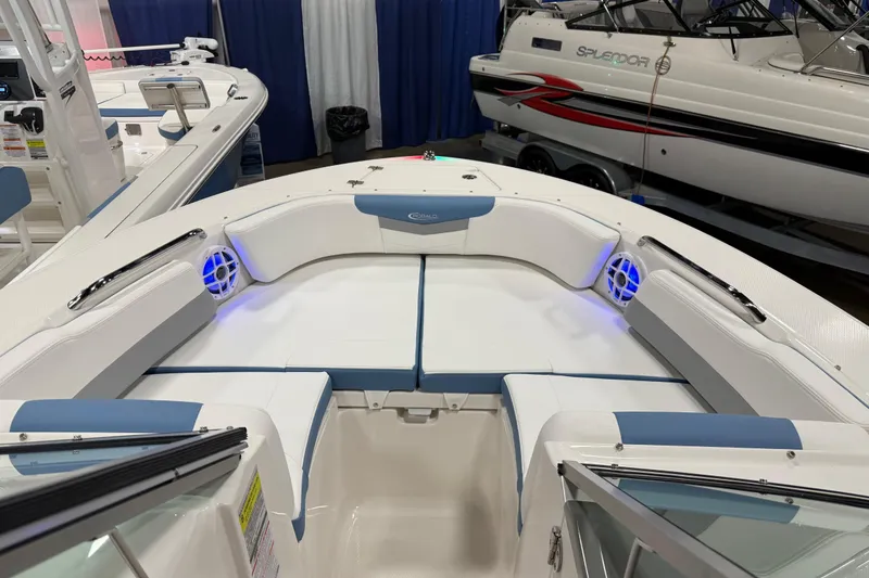Slide: The Image of Manufacturer Provided Image: 2025 Robalo R207 Dual Console boat interior with cushioned seating and sleek design. - 18