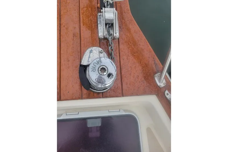 Slide: The Image of Anchor windlass on 2008 Island Packet 370 sailboat deck. - 11