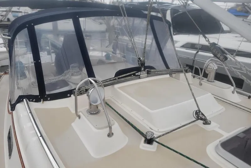 Slide: The Image of 2008 Island Packet 370 sailboat deck with protective canopy and rigging. - 21