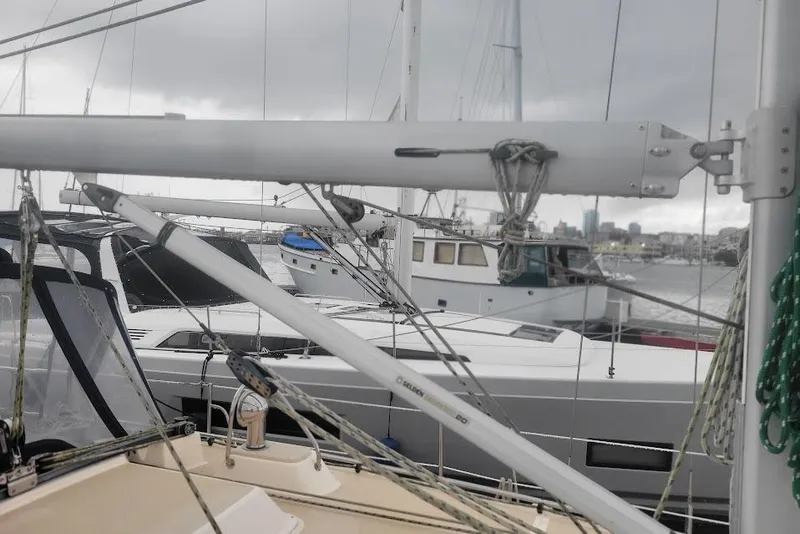 Slide: The Image of 2008 Island Packet 370 sailboat docked in a marina with overcast skies. - 23