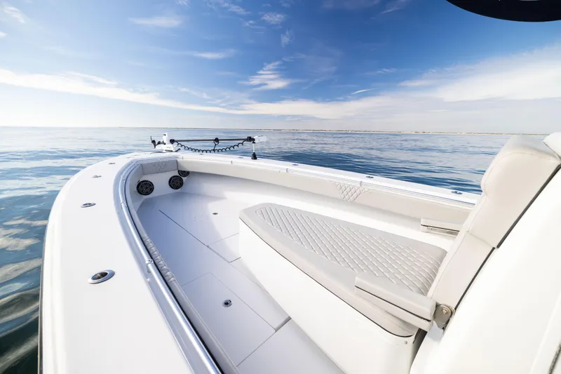 Slide: The Image of 2016 Contender 39 ST boat on calm ocean under clear blue sky. - 49