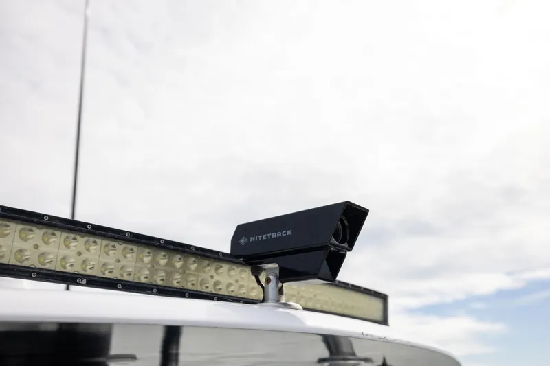 Slide: The Image of NiteTrack camera on 2016 Contender 39 ST boat, mounted beside LED light bar. - 59