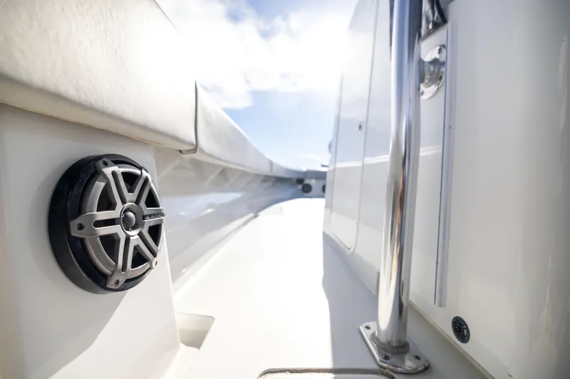 Slide: The Image of 2016 Contender 39 ST boat interior with speaker and chrome railing. - 65