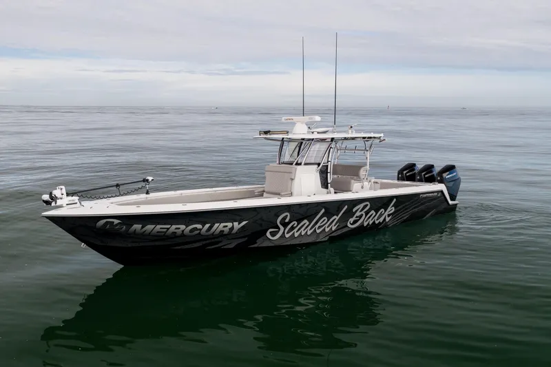 Slide: The Image of 2016 Contender 39 ST boat with Mercury engines on calm water. - 8