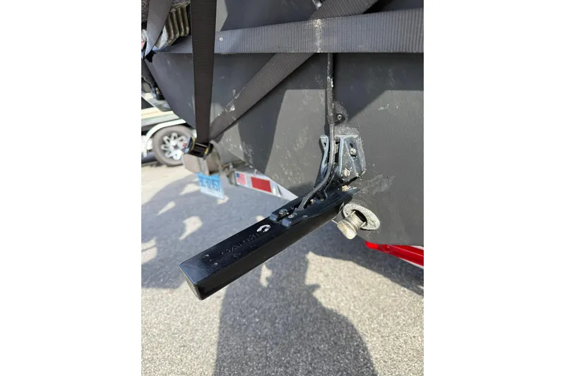 Slide: The Image of 2022 Cobia 262 Center Console boat transom with trailer attachment. - 25