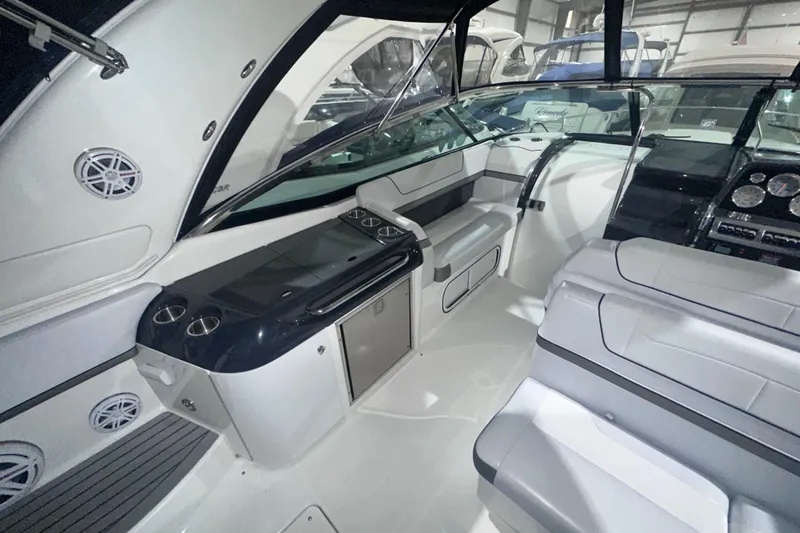 Slide: The Image of 2016 Formula 350 Sun Sport boat interior with sleek seating and modern dashboard. - 13