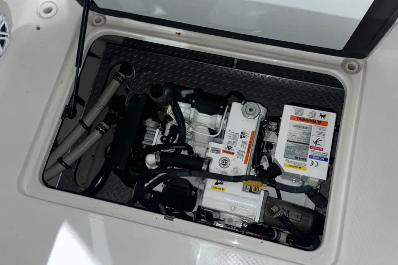 Slide: The Image of Engine compartment of a 2016 Formula 350 Sun Sport boat, showing mechanical components. - 15