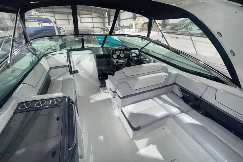 Slide: The Image of 2016 Formula 350 Sun Sport boat interior with sleek seating and modern dashboard. - 16