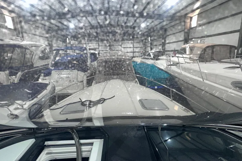 Slide: The Image of Indoor storage of 2016 Formula 350 Sun Sport boat among other vessels. - 26