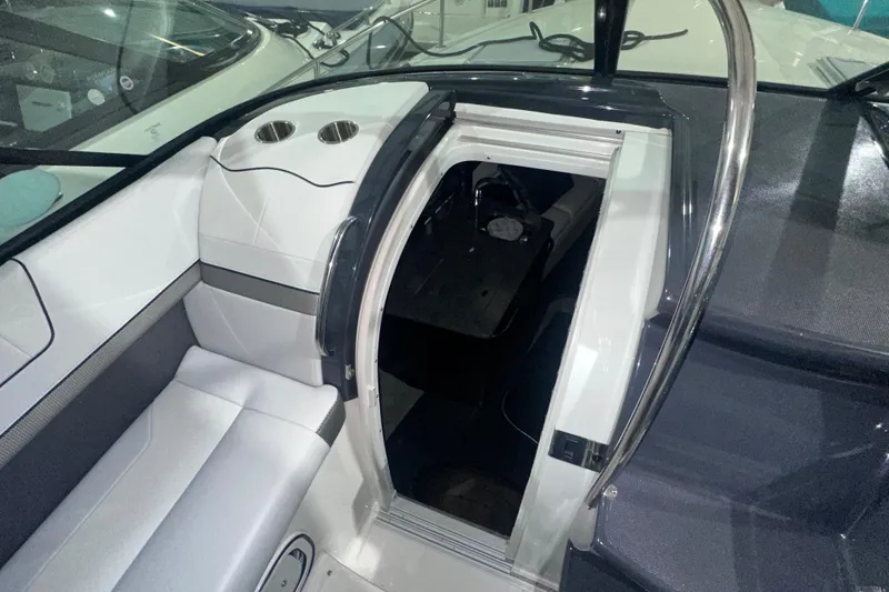 Slide: The Image of 2016 Formula 350 Sun Sport boat interior with cabin entrance and seating area. - 28