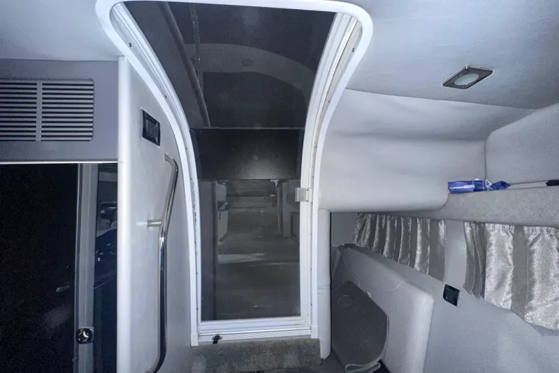 Slide: The Image of Interior cabin of a 2016 Formula 350 Sun Sport boat, featuring sleek design elements. - 29