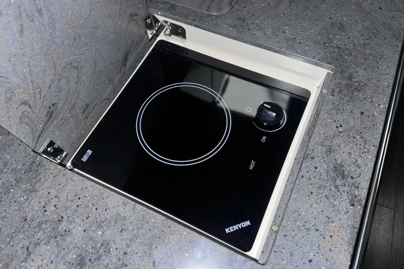 Slide: The Image of Kenyon cooktop in 2016 Formula 350 Sun Sport boat. - 34