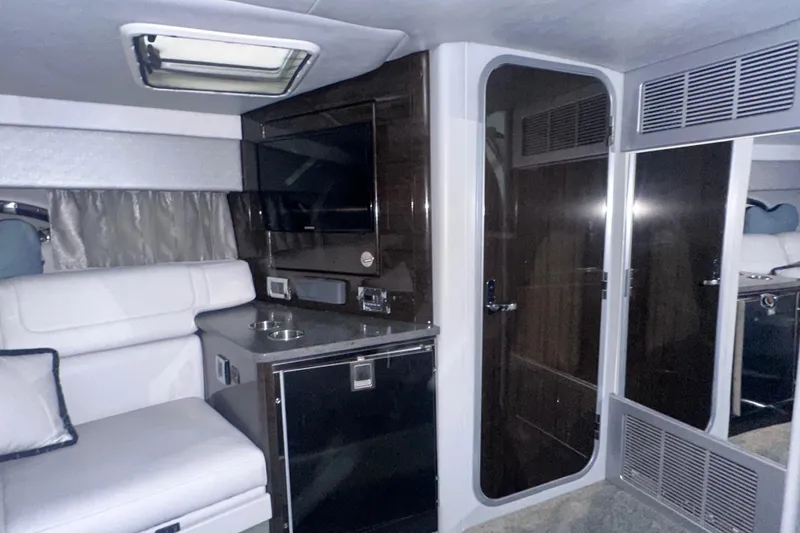 Slide: The Image of Interior of 2016 Formula 350 Sun Sport with seating, TV, and modern amenities. - 36