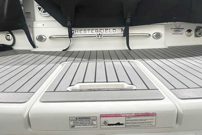 Slide: The Image of 2016 Formula 350 Sun Sport boat deck with safety warnings and Chesterfield, MI label. - 4