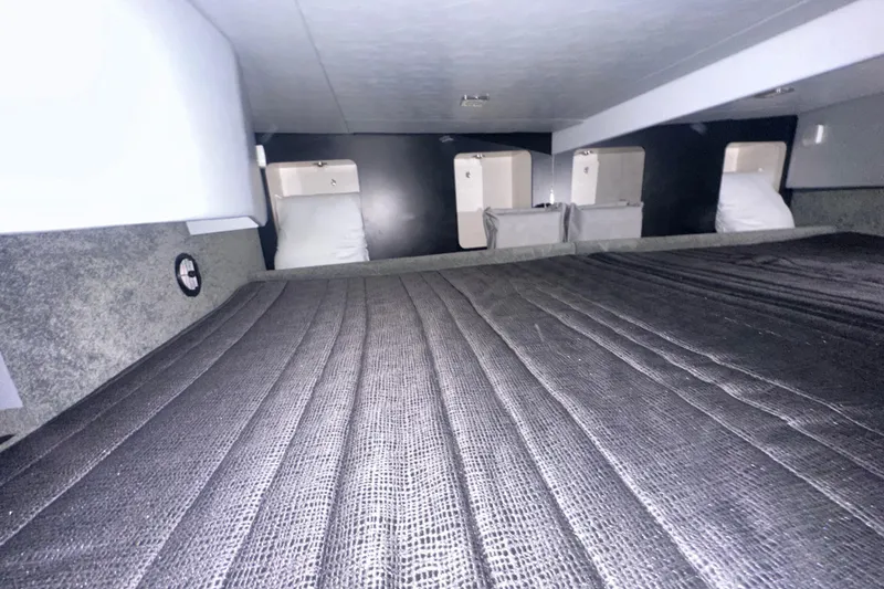 Slide: The Image of Interior cabin of 2016 Formula 350 Sun Sport boat, featuring a cozy sleeping area. - 44