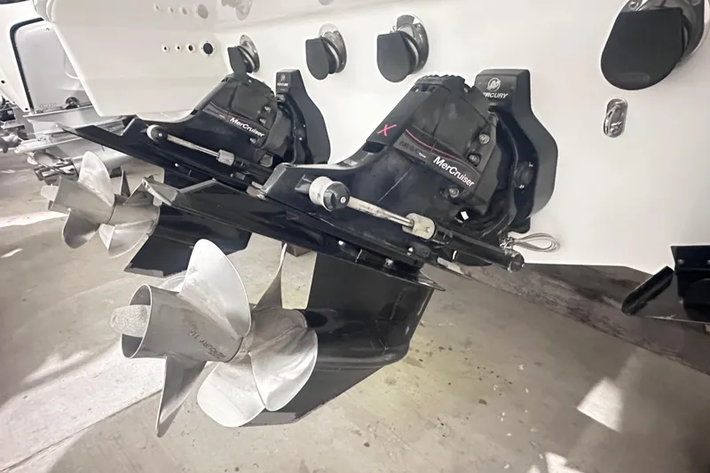 Slide: The Image of 2016 Formula 350 Sun Sport boat with MerCruiser outdrive and dual propellers. - 46