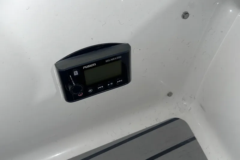 Slide: The Image of Fusion MS-NRX300 stereo control on 2016 Formula 350 Sun Sport boat interior. - 8