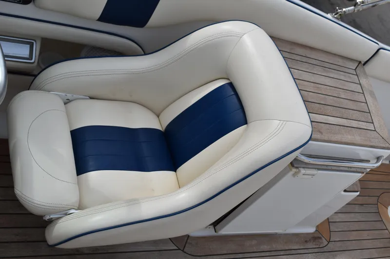 Slide: The Image of 2003 Chris-Craft Launch 25 boat seat with blue and white upholstery. - 23