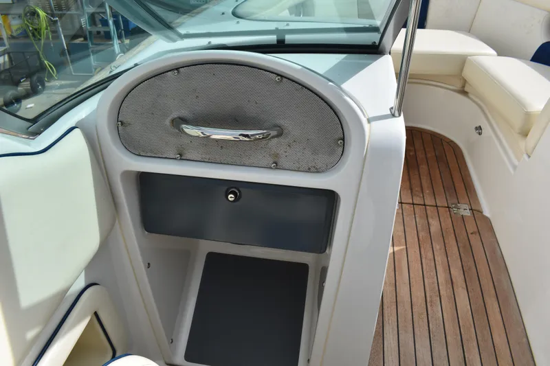 Slide: The Image of 2003 Chris-Craft Launch 25 interior with wood flooring and seating area. - 29