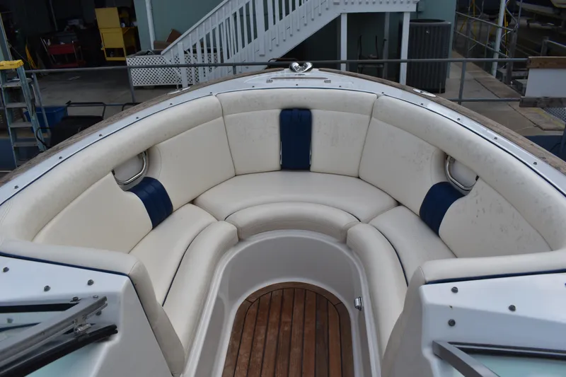 Slide: The Image of 2003 Chris-Craft Launch 25 boat interior with white and blue seating. - 31