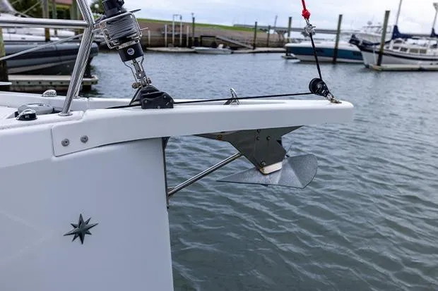 Slide: The Image of Bow of 2020 Jeanneau Sun Odyssey 410 yacht with anchor in marina. - 3