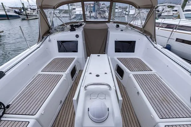 Slide: The Image of 2020 Jeanneau Sun Odyssey 410 yacht cockpit with teak flooring and spacious seating. - 5