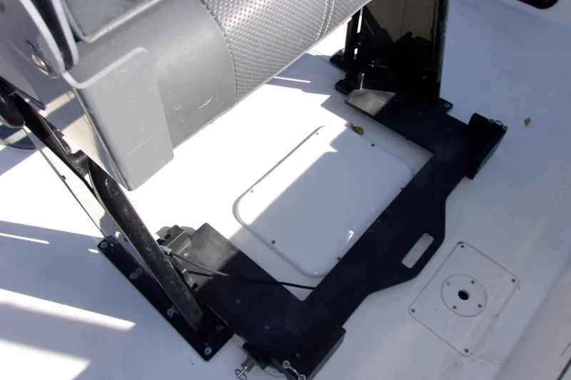 Slide: The Image of 2017 Blue Wave 2200 PureBay boat interior with seat and storage compartment. - 7