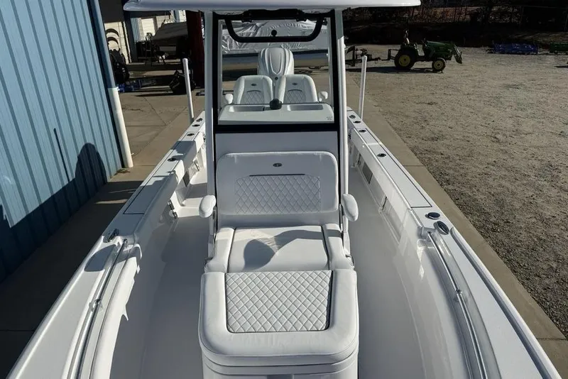 Slide: The Image of 2026 Sportsman Masters 247OE Bay Boat with sleek white seating and modern design. - 15