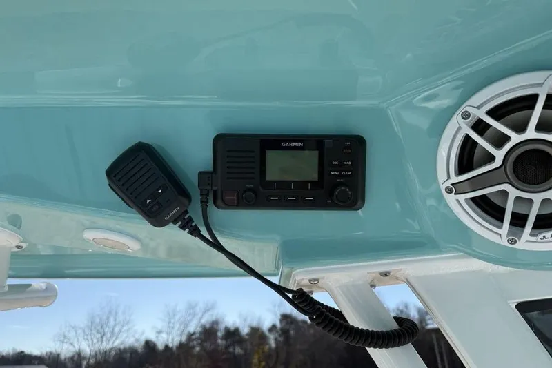 Slide: The Image of 2026 Sportsman Masters 247OE Bay Boat with Garmin radio and JL Audio speaker. - 19