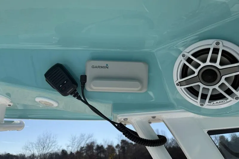 Slide: The Image of 2026 Sportsman Masters 247OE Bay Boat with Garmin device and JL Audio speaker. - 22