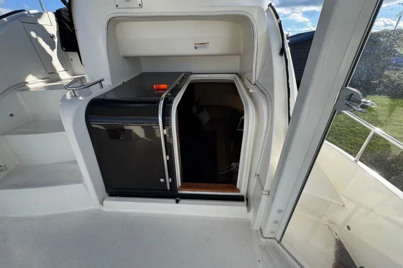 Slide: The Image of 2005 Meridian 368 Motoryacht cabin entrance with steps and open door. - 10