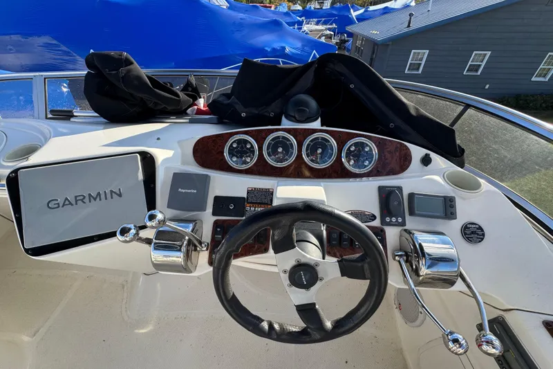 Slide: The Image of Helm of 2005 Meridian 368 Motoryacht with Garmin navigation system and control panel. - 18
