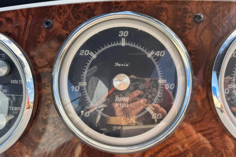 Slide: The Image of Close-up of a 2005 Meridian 368 Motoryacht RPM gauge. - 22