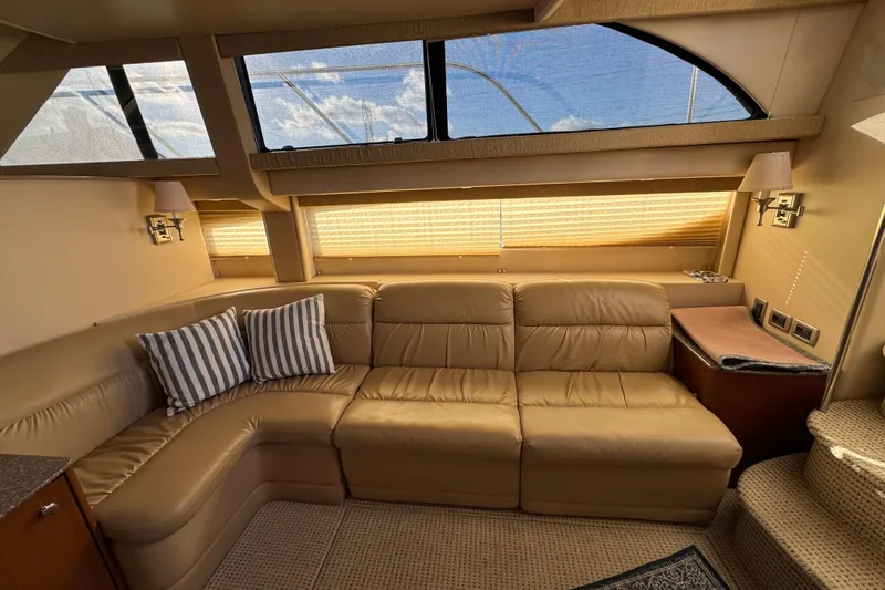 Slide: The Image of Luxurious interior of 2005 Meridian 368 Motoryacht with leather seating and striped cushions. - 33