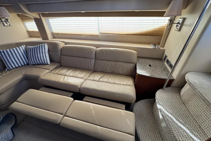 Slide: The Image of Luxurious interior of 2005 Meridian 368 Motoryacht with leather seating and striped cushions. - 34