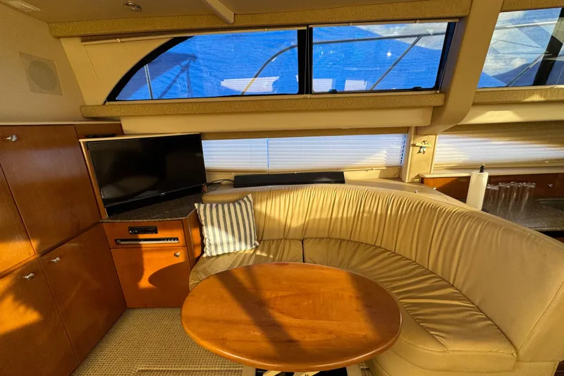 Slide: The Image of Luxurious interior of 2005 Meridian 368 Motoryacht with cozy seating and TV. - 35