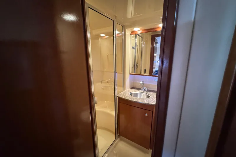 Slide: The Image of Bathroom interior of 2005 Meridian 368 Motoryacht with shower and sink. - 54